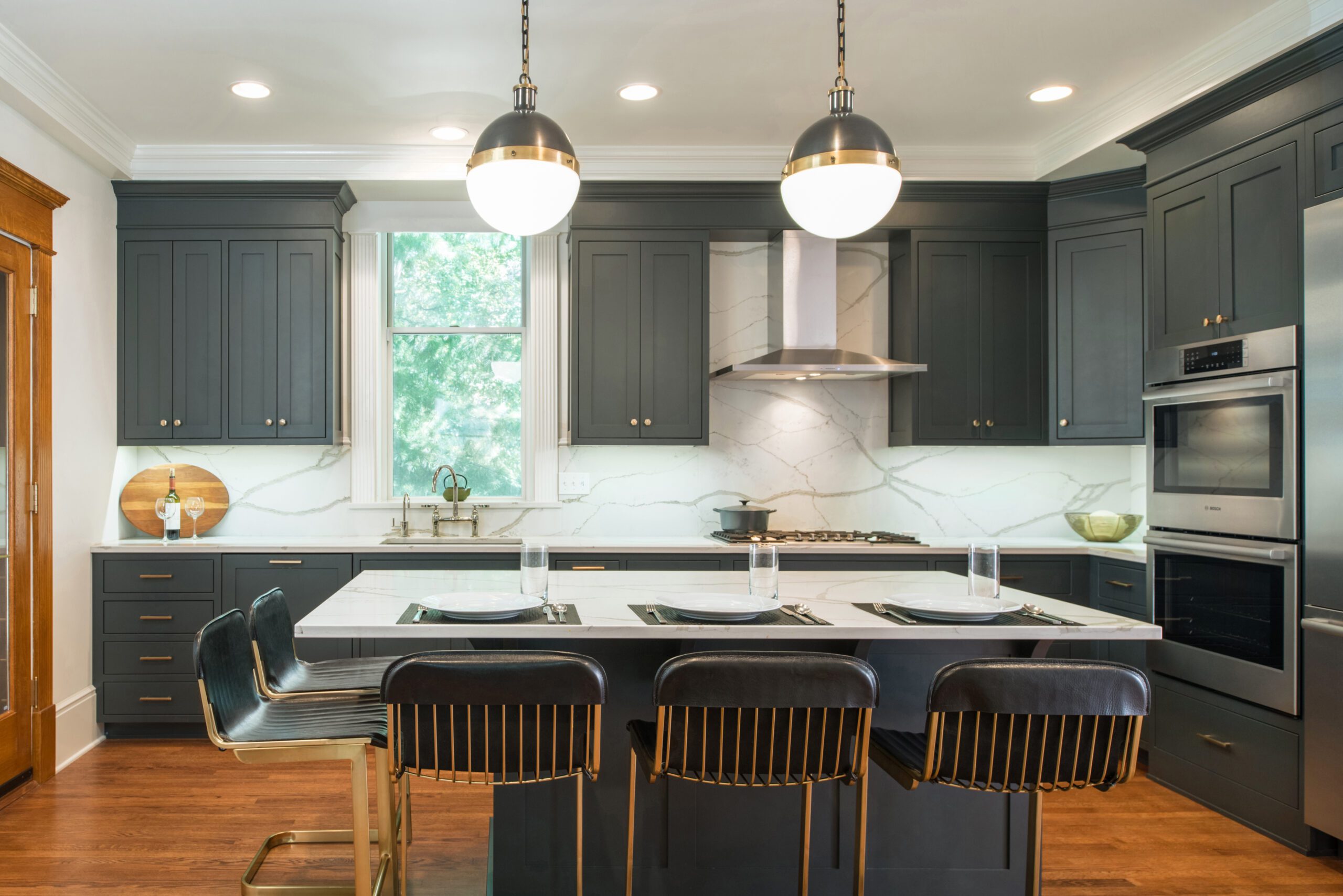 Bright kitchen green cabinetry